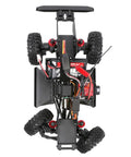Underside view of Redcat Racing Ascent 18 Scout II Brushless 4x4 One Eighteenth Scale RC Crawler showcasing chassis and tires