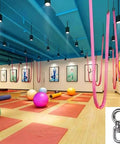 Yoga studio with pink aerial silks using Heavy Duty Workhorse Bearing Swivel With 360 Degree Rotation And 820 Lb Capacity For Hanging