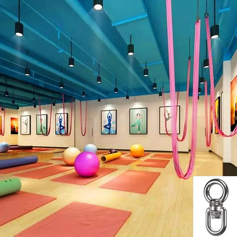 Yoga studio with pink aerial silks using Heavy Duty Workhorse Bearing Swivel With 360 Degree Rotation And 820 Lb Capacity For Hanging