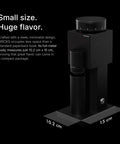 Badass Electric Coffee Grinder With 150 Tight Adjustments, Slick Stainless Steel Housing, And Knockout Uniform Grind For Espresso Pour Over And French Press In Matte Black on a countertop.