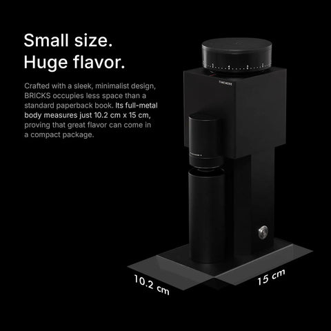 Badass Electric Coffee Grinder With 150 Tight Adjustments, Slick Stainless Steel Housing, And Knockout Uniform Grind For Espresso Pour Over And French Press In Matte Black on a countertop.