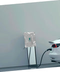 Rock Solid EV Wall Charger Cover Built To Crush Rain And UV Exposure Sleek Outdoor Shield on charger with vehicle.
