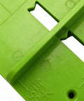 Close-up view of 35mm Hinge Template Router Jig For Cabinets Drawers And Furniture Doors With Pro Grade Durable Aluminum Guide And Adjustable Stops Precision Concealed Hinge Boring Jig For Woodworking Installations in green plastic.