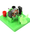 Hands On Circuit And Motor Lab Kit For Students DIY DC Motor Model on green base with visible copper coil and plastic fan blade.