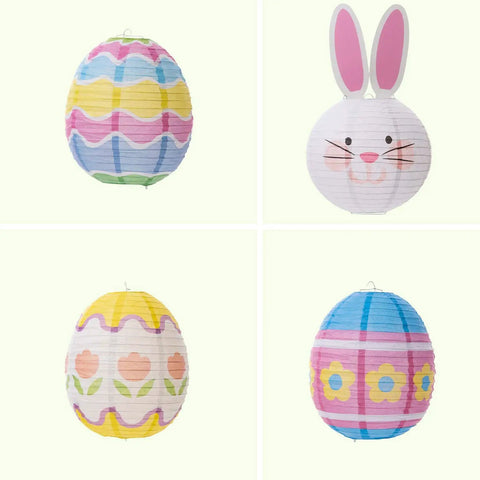 Four hanging lanterns featuring Easter egg and bunny designs from 9 Piece Easter Paper Lantern Set With Bunny And Egg Designs.