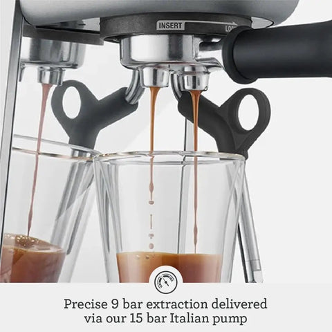 Compact Kitchen Workhorse Certified Refurbished Espresso Maker Featuring Automatic Steam Wand And Dose Control Grinding For Pro Home Barista Shots In Sleek Brushed Steel Cabinet extracting espresso into glasses.