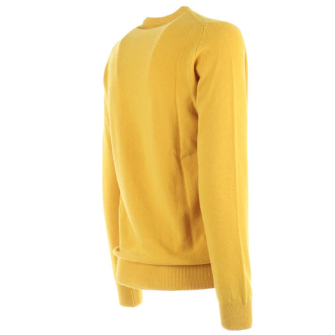 Back view of yellow knitted sweater with ribbed cuffs and hem, showcasing long sleeves and a smooth textured finish.