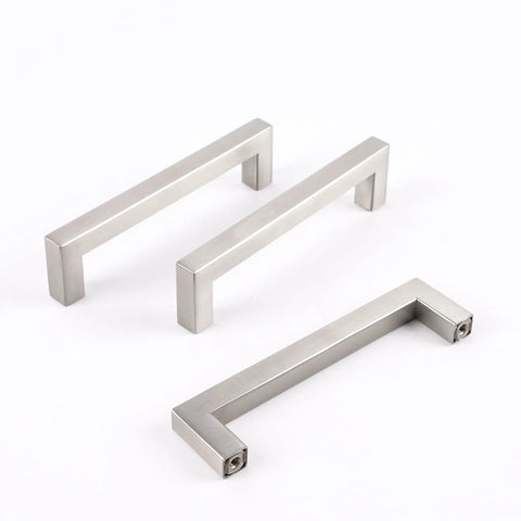 Champagne Oval Flat Cabinet Handles Set in Stainless Steel, 6-3/10 Inch Center for Kitchen Cabinets and Dressers, shown in three views.