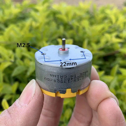 Close-up of Two Pack RC500 KN Mini 32mm Round Spindle Motor DC 6V 12V 5300 RPM with dimensions M2.5 and 22mm visible