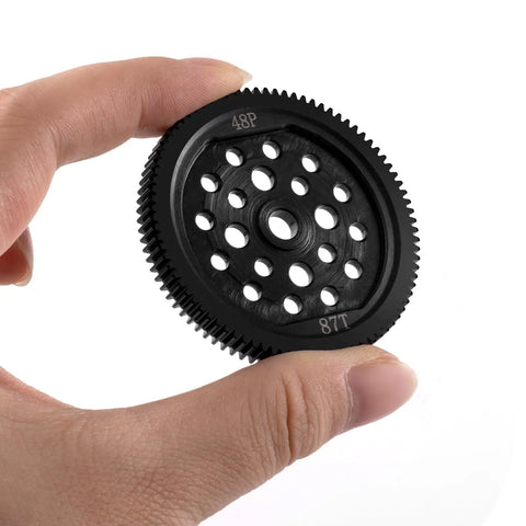 Hand holding Beefy Steel Spur Gear 48P 87T 93T For ECX 2WD Ruckus Axe Brutus Circuit AMP MT 1/10 RC Car