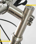 Close-up view of Titanium Bicycle Headset Spacer Set 4 or 6 pieces 1-1/8 inch 28.6mm diameter threadless spacers on bike stem.