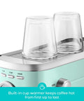 Compact Stainless Steel Espresso Machine With Powerful Steam Wand For Killer Lattes And Smooth Shots At Home showing built-in cup warmer for coffee.