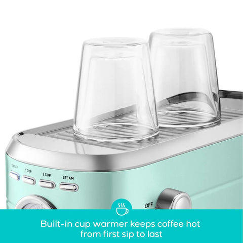 Compact Stainless Steel Espresso Machine With Powerful Steam Wand For Killer Lattes And Smooth Shots At Home showing built-in cup warmer for coffee.