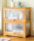 2 Tier Desktop Bookshelf With Transparent Flip Up Door Space Saving Storage Rack featuring bamboo frame and clear panels.