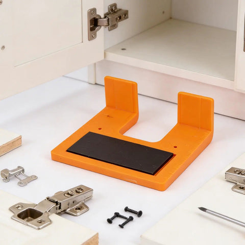 90 Degree Cabinet Hinge Installation Tool With Magnetic Mounting for Woodworking on display with hinges and screws