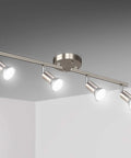 4 Light Track Lighting Kit With 24.8 Inch Matte Nickel Bar And Flexible Rotatable Heads, ceiling spotlight fixture in action.
