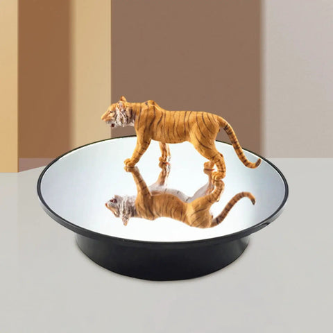 Premium Electric Rotating Turntable Display Stand With Adjustable Speeds For Jewelry Makeup And Ornaments Black Base Mirror 360 Swivel Showcase Tray showing a tiger figurine on a reflective surface.