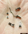 Five Packs Of Two Micro Hinges Ten Piece Miniature Puppet Hinge Set For Ball Socket Wrist Knee And Elbow Joints Stop Motion Animation Armature Includes Ten Screws For Puppet Pros And Model Makers, 16mm silver hinges and screws in hand