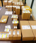 Packages of Beefy Torque Brushless DC Servo Motor With Hall Encoder Feedback for robotics and automation on a table.