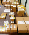 Assorted boxes of electromagnetic brake holding brakes, 4N 84mm axis, 12T/14T/15T, DC24V on a table.