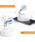 Cordless Indoor RGBW LED Spotlight Kit with rotatable head showing size comparison with smartphone.