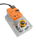 Heavy Duty 40Nm Modulating Damper Actuator For Hvac Systems With Precise Position Feedback And Dual Voltage Power mounted on a base.