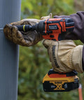 Worker uses 20V Battery Powered Impact Driver With One Quarter Inch Hex Quick Connect 210 Foot Pounds Max Torque Brushless Motor