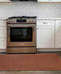 All Day Comfort Anti Fatigue Kitchen Floor Mat With Cushy PVC Construction Waterproof Non Slip Rug in front of stove