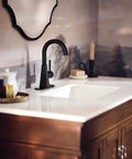 Ronan Matte Black One Handle Bathroom Sink Faucet With Single Hole Design Optional Deck Plate And Spring Loaded Drain Assembly Modern Sleek Style For Contemporary Bathrooms on a elegant white sink