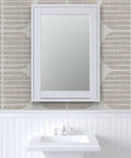 Super Sleek Geometric Stripe Vinyl Wallpaper Shows Off Subtle Leather Texture And Delivers Knockout Durability For Heavy Traffic Commercial Spots Or Wild Home Rebounds Featuring Type Ii Sturdiness And Custom Prints That Bring The Real Deal Vibes in a bathroom setting with a white sink and mirror.