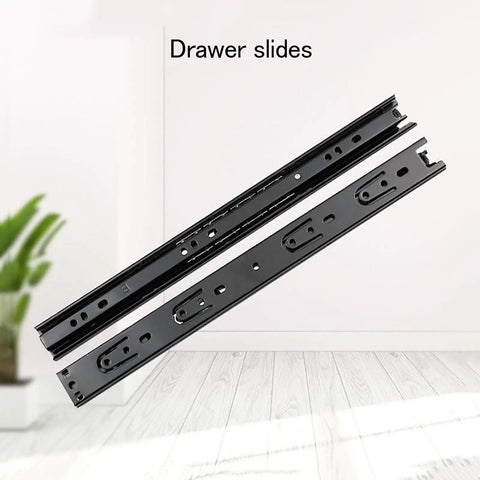 Bulk Thirty Pair Full Extension Ball Bearing Side Mount Cabinet Drawer Slides Featuring No Sweat Install And Silky Smooth Glide For Sweet Kitchen Updates And Quick Diy Projects, black metal slides on a light wooden floor.