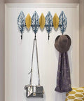 Slick Wall Mounted Coat Rack Heavy Duty Steel Hooks For Entryway Door Hallway Closet with hats and scarves hanging.
