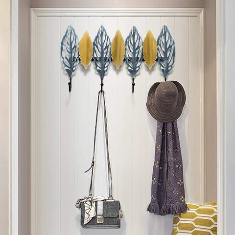 Slick Wall Mounted Coat Rack Heavy Duty Steel Hooks For Entryway Door Hallway Closet with hats and scarves hanging.
