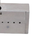 Close-up of stainless steel watch gearwheel reaming tool for minute wheel tightening and precision gear adjustments