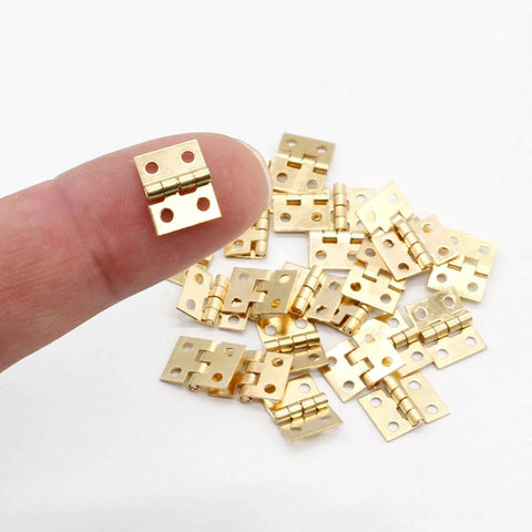 24 Pack Mini Brass Hinges 180 Degree Rotation For Jewelry Box Cabinet DIY Projects with mounting nails, golden, 10x8mm, finger size comparison