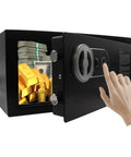 Hand accessing Biometric Fingerprint Safe Lock Box With Steel Construction And Key Backup, Black 0.6 Cubic Feet, with valuables inside.