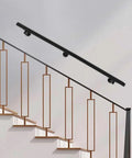 Kick Ass Heavy Duty Wall Mount Handrail In Matte Black Stainless Steel With Non Slip Grip For Modern Indoor Stairs, installed above stairs.