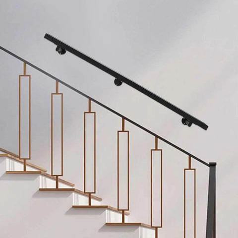 Kick Ass Heavy Duty Wall Mount Handrail In Matte Black Stainless Steel With Non Slip Grip For Modern Indoor Stairs, installed above stairs.