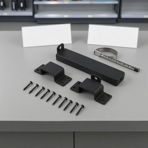 Heavy Duty Sliding Bar Gate Latch With Padlock Hole In Matte Black Metal For Outdoor Garden Sheds And Fences Built Tough With Straight Up Secure Locking Action That Is The Real Deal hardware kit with gate latch and screws on gray surface.