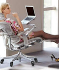 Woman in mesh office chair with heavy duty 2 inch chair caster wheels set of 5 with plug in 7/16 inch stem 7/8 inch length