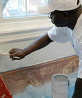 Painter using SuperTuff Plastic Drop Cloth For Big Paint Jobs 9 By 12 Feet 108 Sq Ft Clear See Through Lightweight Yet Tough Leak Proof Floor And Surface Cover For Painting Projects