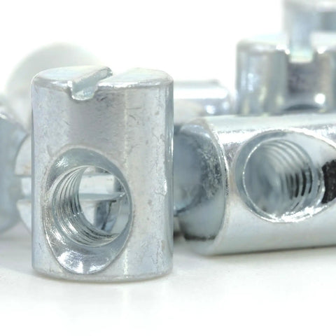 Top Tier Replacement Cross Dowel Barrel Nuts Compatible With Ikea Part 100514 For Crib And Bunk Bed Frames. Close-up of zinc plated steel nuts.