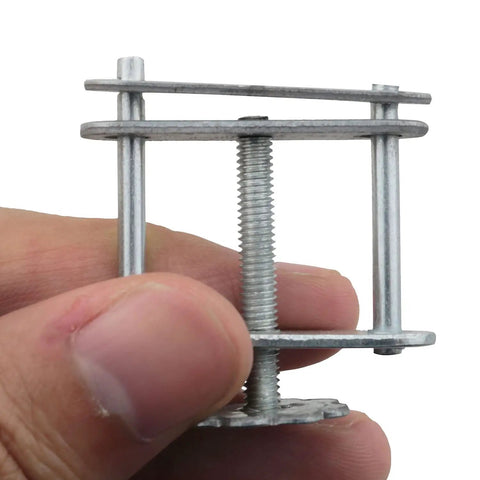 Close-up of a Four Pack Flow Control Hose Clamps Iron Plated Water Stop Clips With Swivel Screws, shown with threaded design in hand