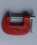 Heavy Duty Steel C Clamp 1 Inch G Clamp For Woodworking And Welding Jobs With Swivel Pad And Acme Screw Thread, red finish, top view.