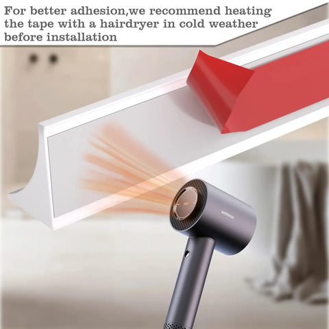 Heating self-adhesive backing of 39 Inch Shower Threshold Dam Barrier Silicone Shower Door Seal using a hairdryer for installation