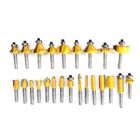 24 Piece 1/4 Inch Shank Router Bit Set Premium Carbide Cutters For Sharp Trimming Engraving Milling with yellow tips and steel shanks.