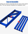 Assembly components of the Badass Adjustable Tire Display Rack, blue steel frame and rails for easy setup.