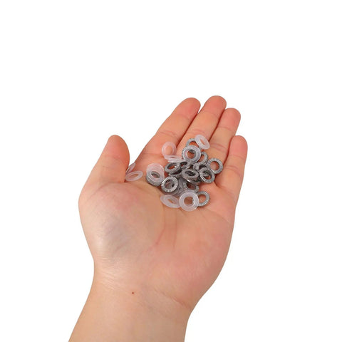 Hand holding assorted Heavy Duty Metal Wedge Locking Washers for Drum Rack Mounting Hardware and Cymbal Stand secure fasteners.