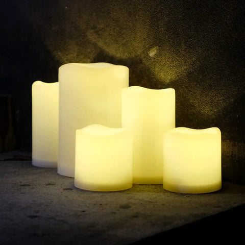 Outdoor IP44 Weatherproof 4x6 Inch Warm White LED Flameless Pillar Candles Set Of 2 With Remote And Timer Resin on table