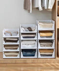 Four Pack Foldable Wardrobe Storage Boxes, Stackable Clothes Drawer Organizers with folded clothes in a closet setup